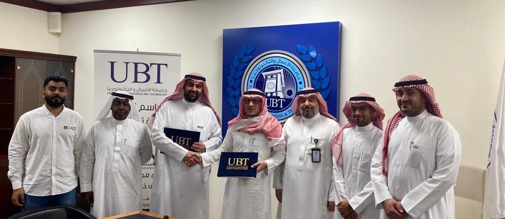 ICAD and UBT representatives at the signing of their memorandum of understanding